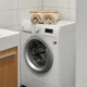lavadora para casa de vacaciones compacta en una vivienda pequeña