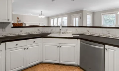 Panel de un lavavajillas Balay VT 913 con un aviso de error y el filtro visible