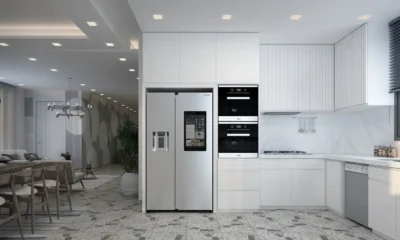 Cocina moderna con frigorífico combi integrable 2 metros oculto tras paneles de mueble
