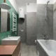 Manual caldera Junkers Cerapur Comfort ZWBE 25 3C mostrado junto a una caldera mural moderna en una instalación doméstica