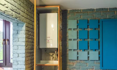 Caldera Ferroli Bluehelix Hitech RRT 28 instalada en una pared de una vivienda